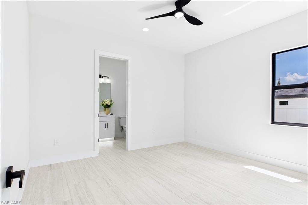 SECOND PRIMARY SUITE offers added PRIVACY & COMFORT w/ its own beautifully finished ensuite featuring a WALK-IN GLASS SHOWER & designer finishes.