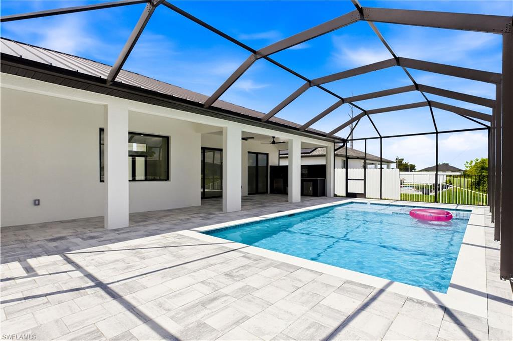 Embrace the ultimate SWFL LIFESTYLE w/ sun-soaked days in the HEATED POOL & SPA and effortless entertaining under the expansive SCREENED LANAI.