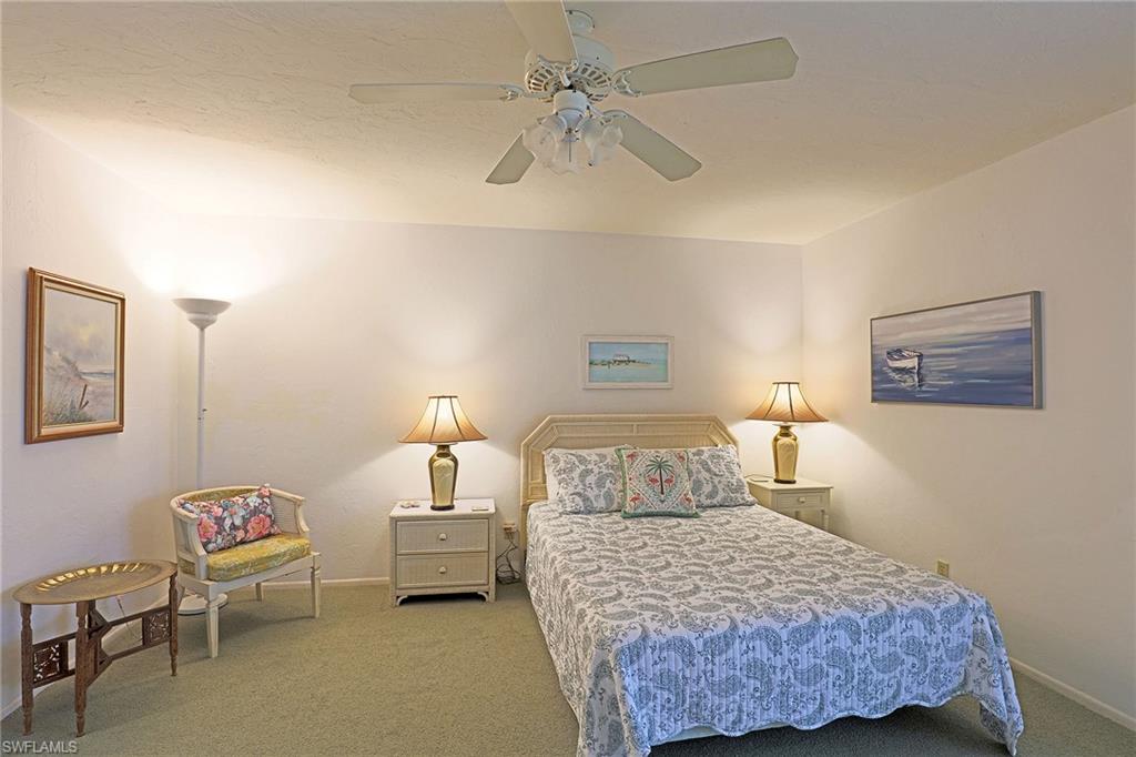 Recessed ceiling fan, carpeted flooring, and neutral wall tones