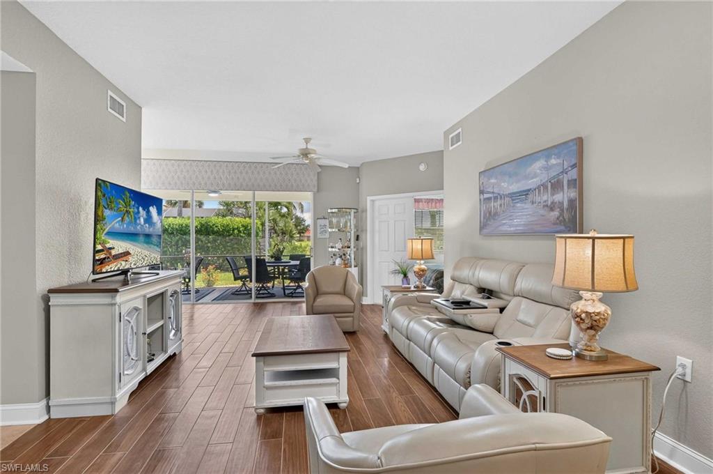 Wood-finish flooring throughout, light neutral wall tones