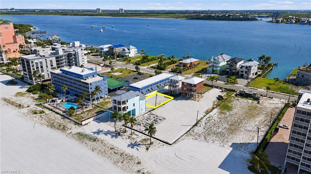 Expansive coastal waterfront lot with direct beach access - Virtually Edited Image