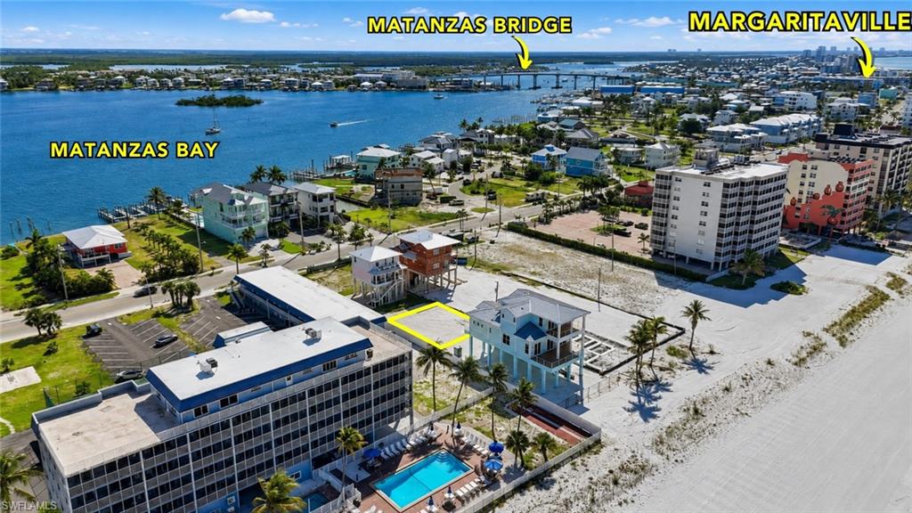 Expansive coastal waterfront lot with direct beach access - Virtually Edited Image