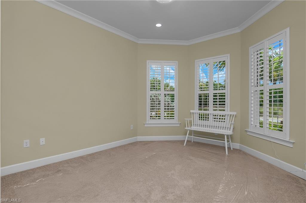 Wall-to-wall carpeting with light-colored walls