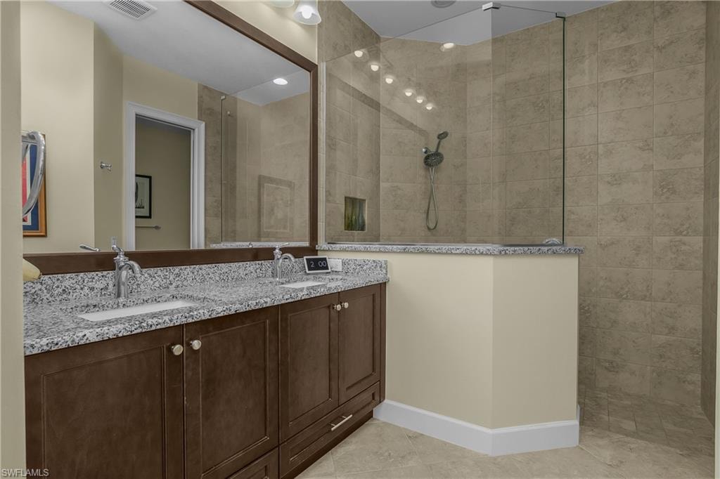 Dual vanity with granite countertop and undermount sinks