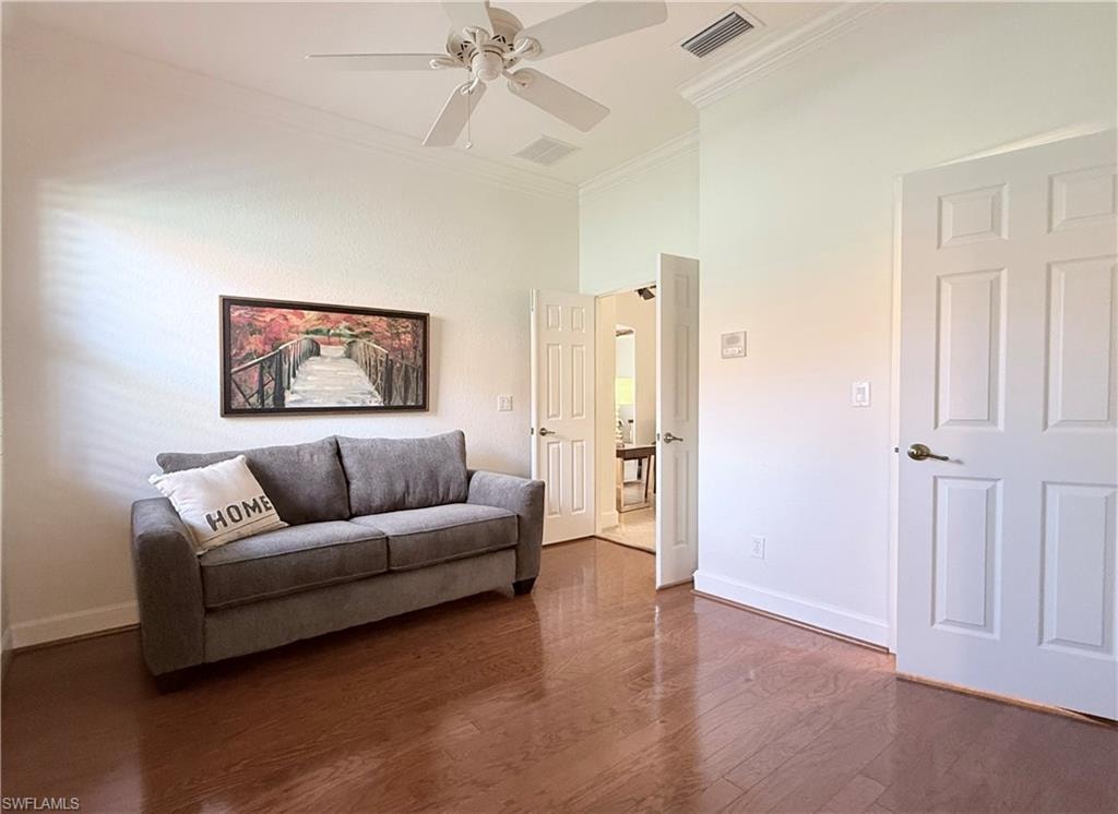 Den w/ laminate plank flooring