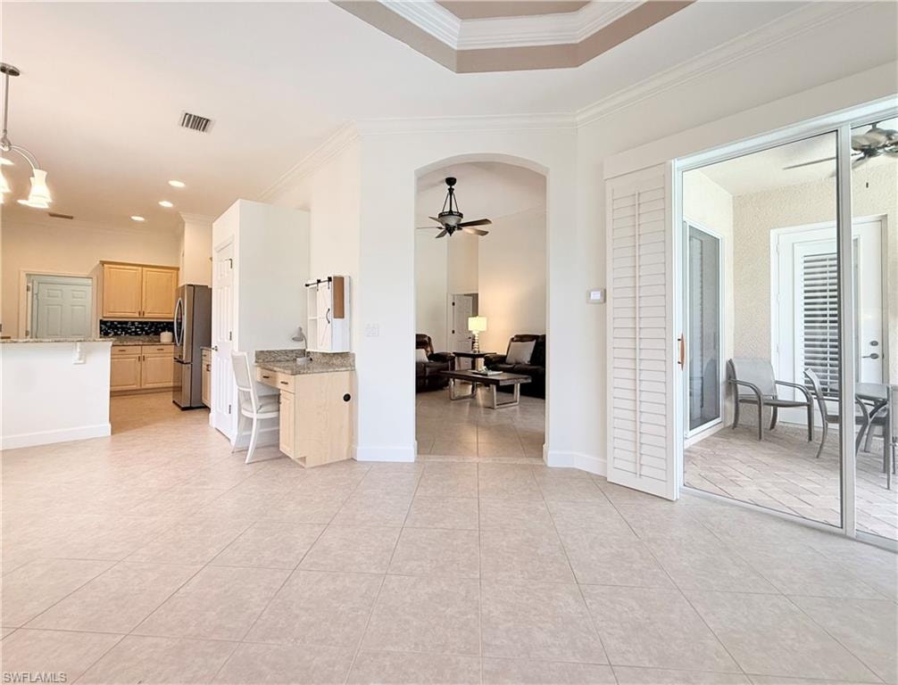 View from family (flex) room to kitchen,  main living room & outdoor living space