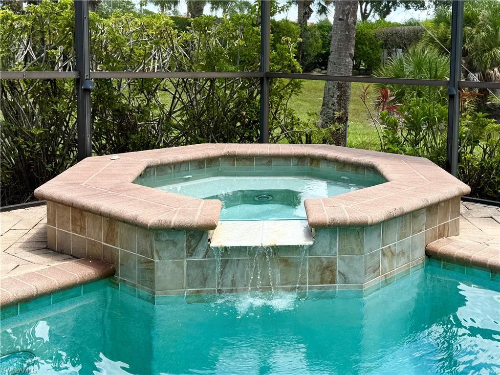 Spa cascades into pool