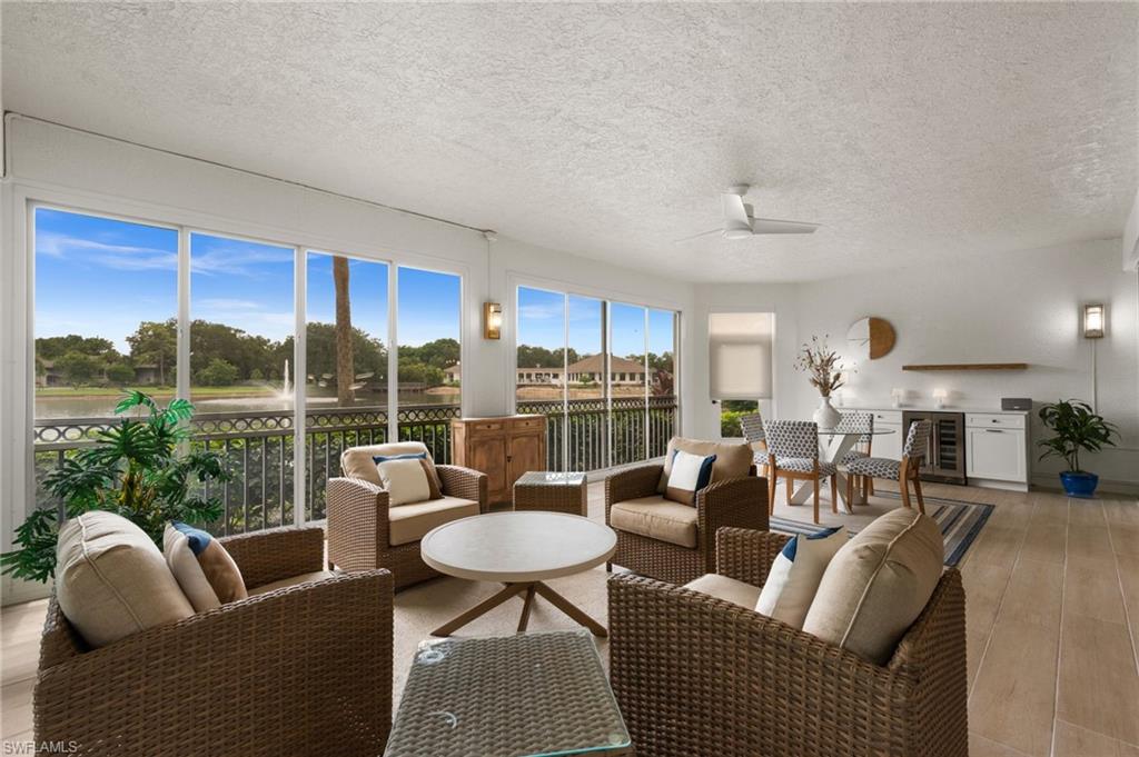 Lanai living with a bar and beverage cooler