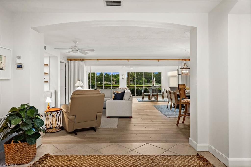 Arched entryway opening to main living areas