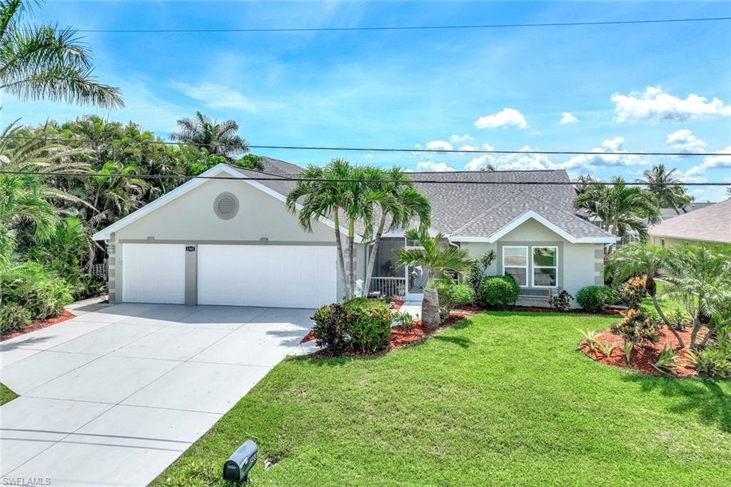 Beautiful curb appeal with nice landscaping and 3 car garage.