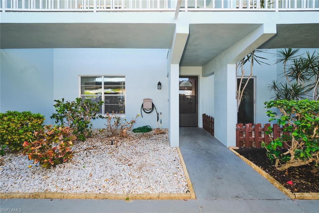Covered entryway with concrete walkway