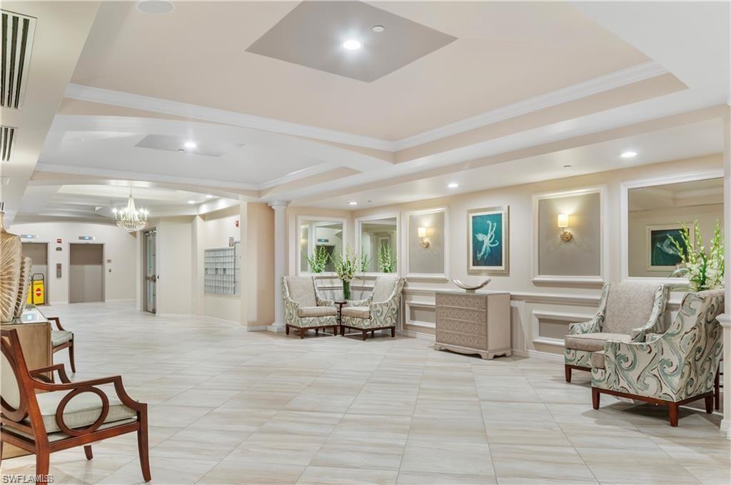 Community lobby featuring crown molding and recessed lighting