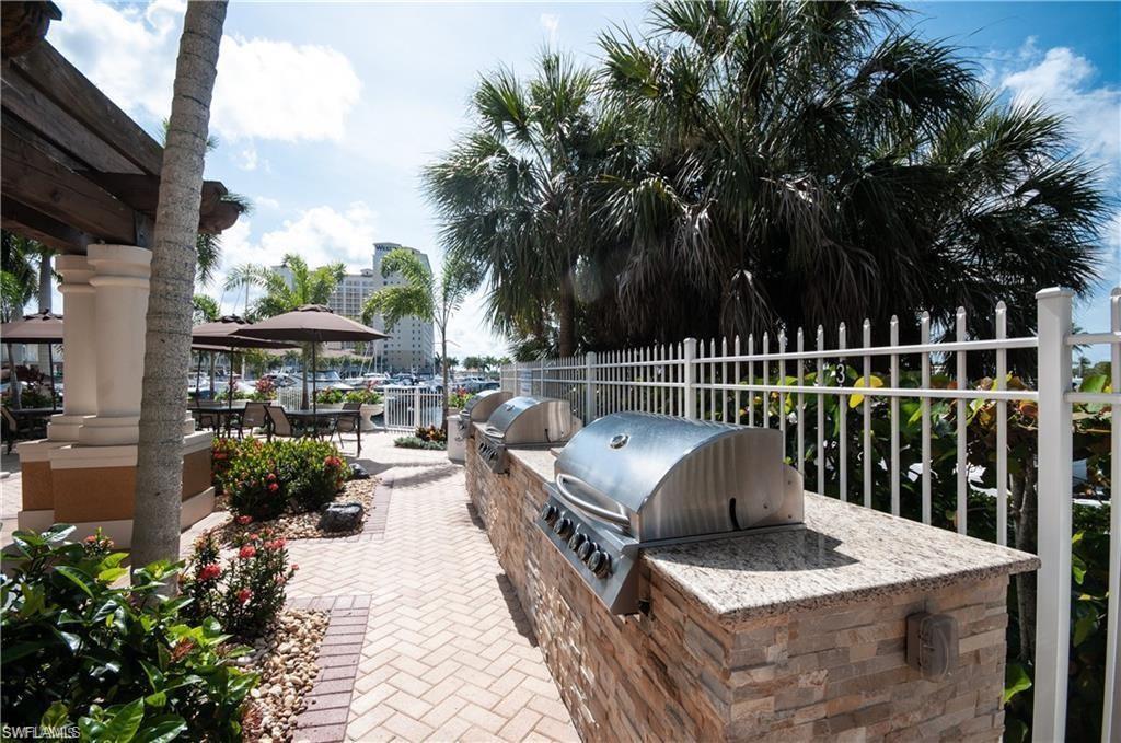 View of patio featuring an outdoor kitchen