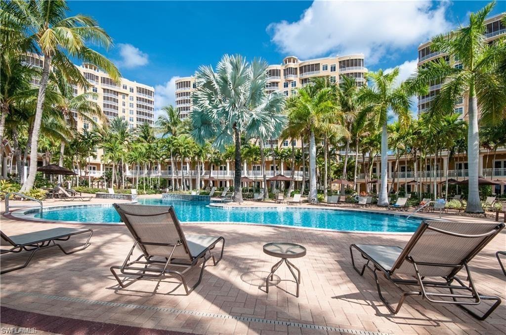 Community pool featuring a patio area