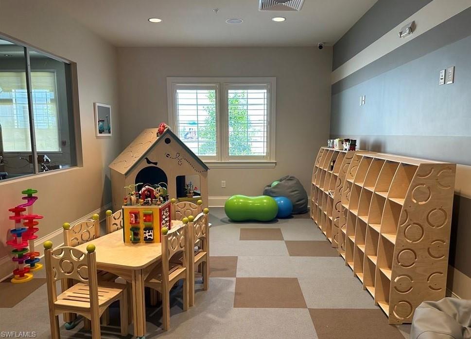 Recreation room featuring carpet floors