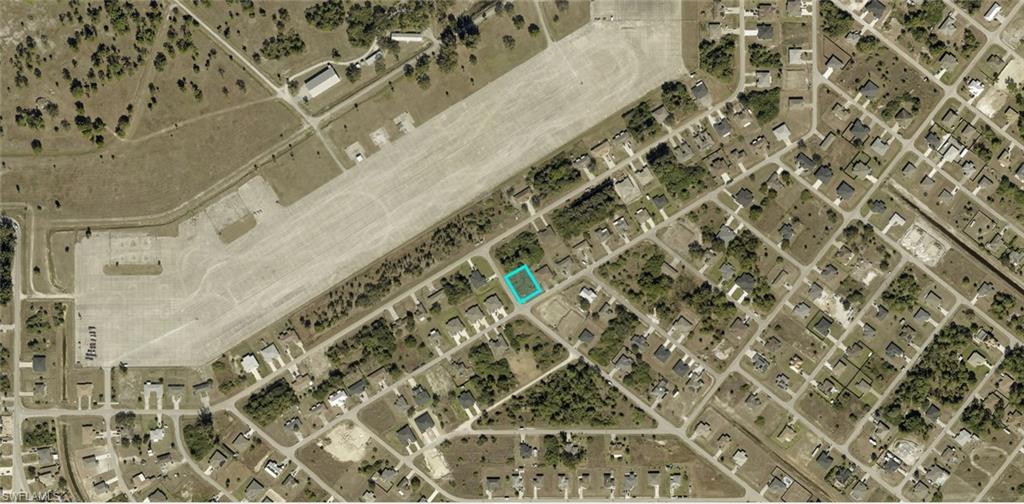 Aerial Map. Displaying the property's location within a residential and undeveloped area