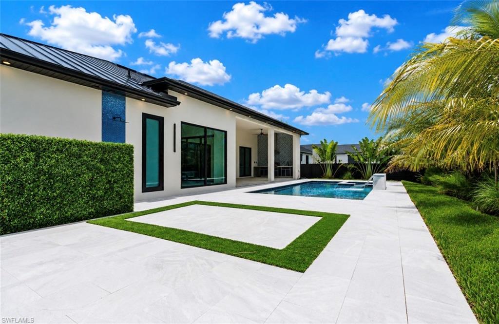 Contemporary exterior with white stucco finish
