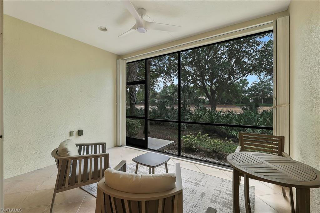 Sunroom / solarium with a wealth of natural light