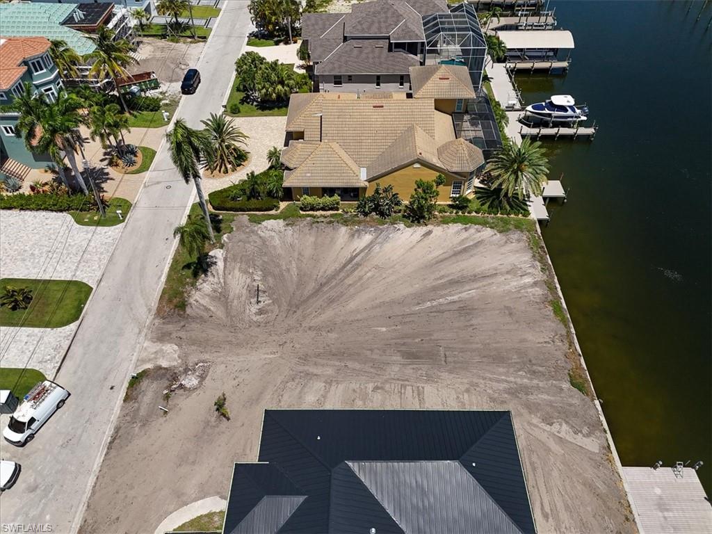 Cleared waterfront lot with direct canal access
