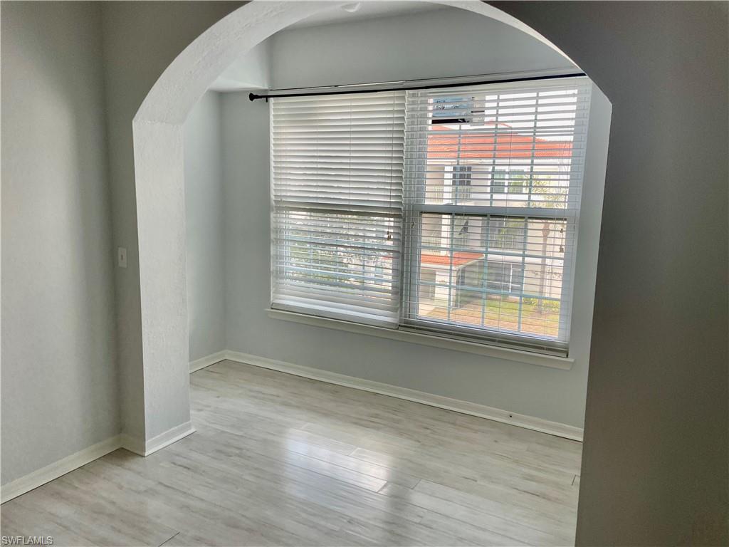 Empty room featuring light hardwood / wood-style flooring and a healthy amount of sunlight
