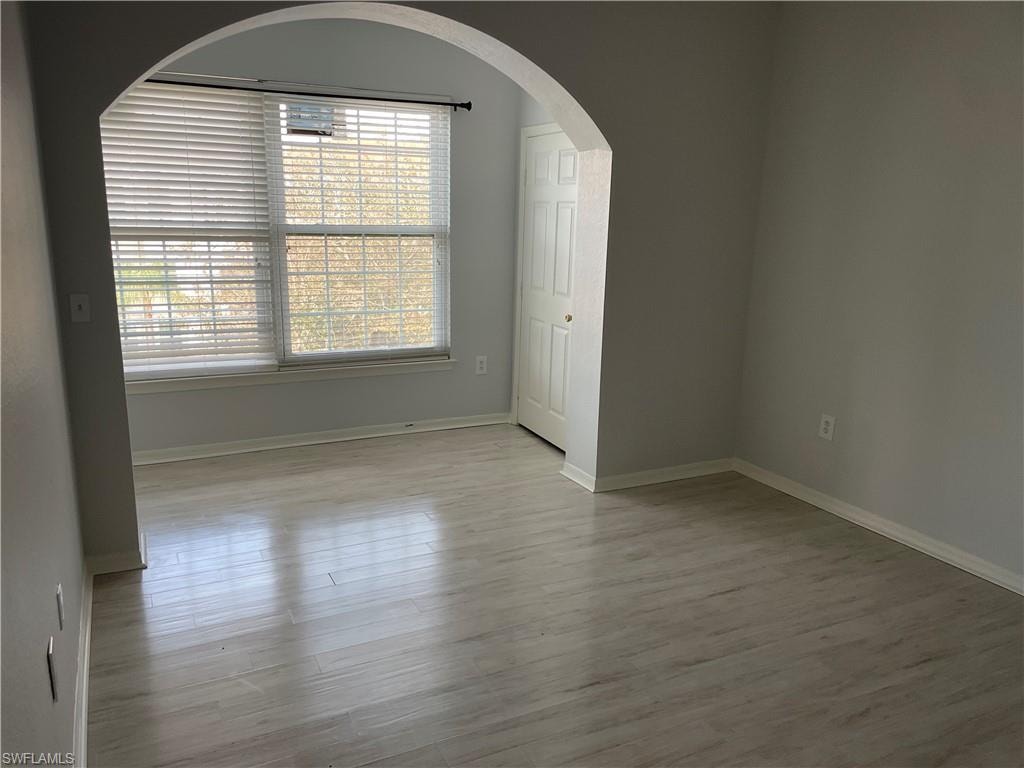 Spare room featuring light hardwood / wood-style flooring