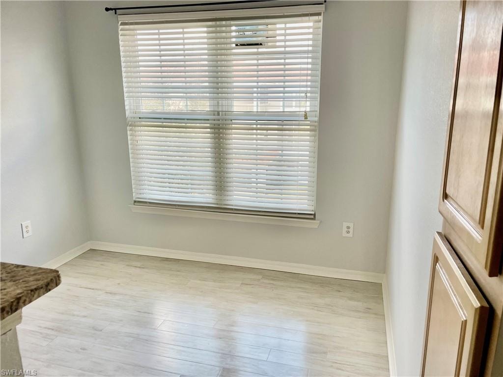 Empty room featuring light hardwood / wood-style floors