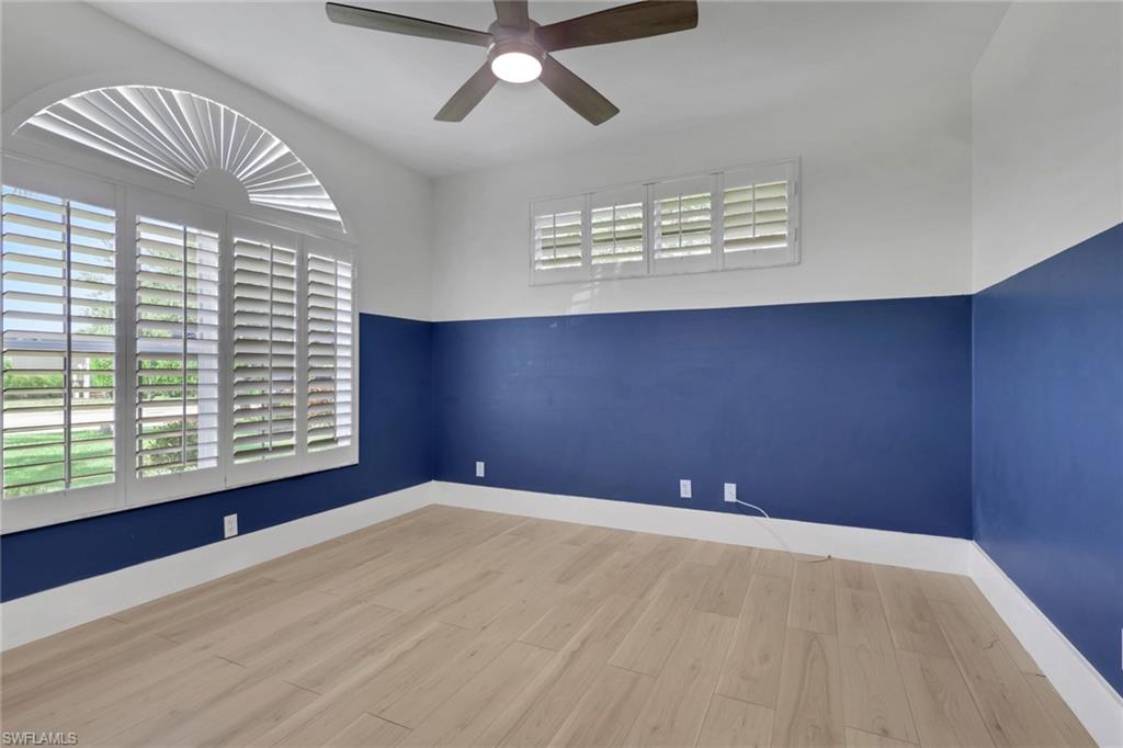 Wood-finish flooring with crisp white trim