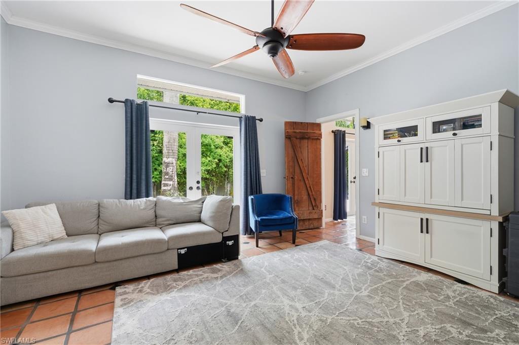 FLEX ROOM 13' x 15' -  OFF PRIMARY BEDROOM SUITE...SO MANY POSSIBILITIES!!  FRENCH DOORS EXITING OUTDOOR LIVING SPACE...