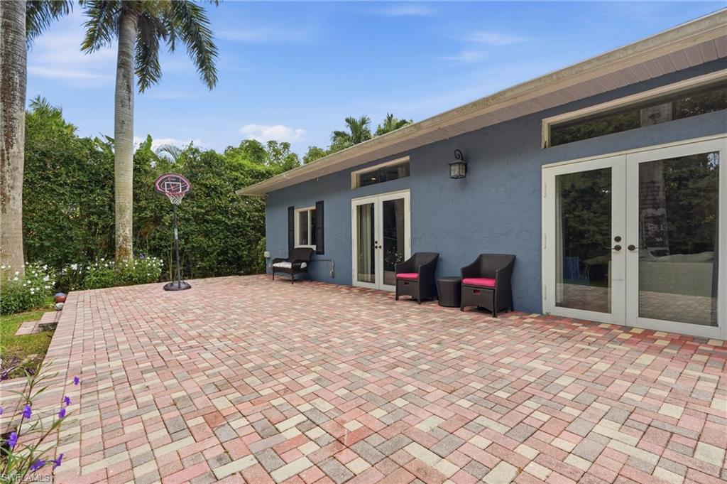 OUTDOOR LIVING AND ENTERTAINING SPACE WITH LARGE PATIO DECK...