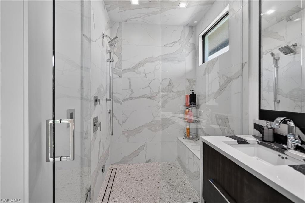 Primary 2 bath offers dual sinks and steam shower