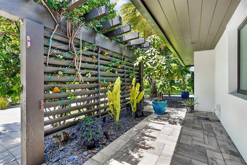 Front Porch with Privacy Fence and Landscaping