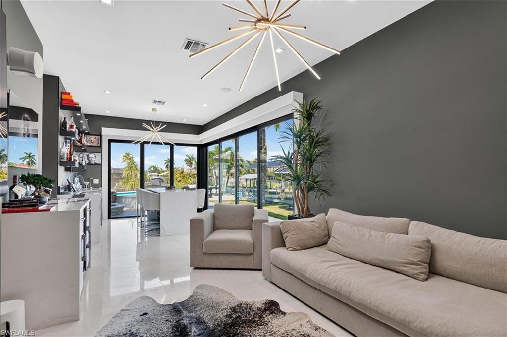 Additional entertainment area overlooking the canal and pool