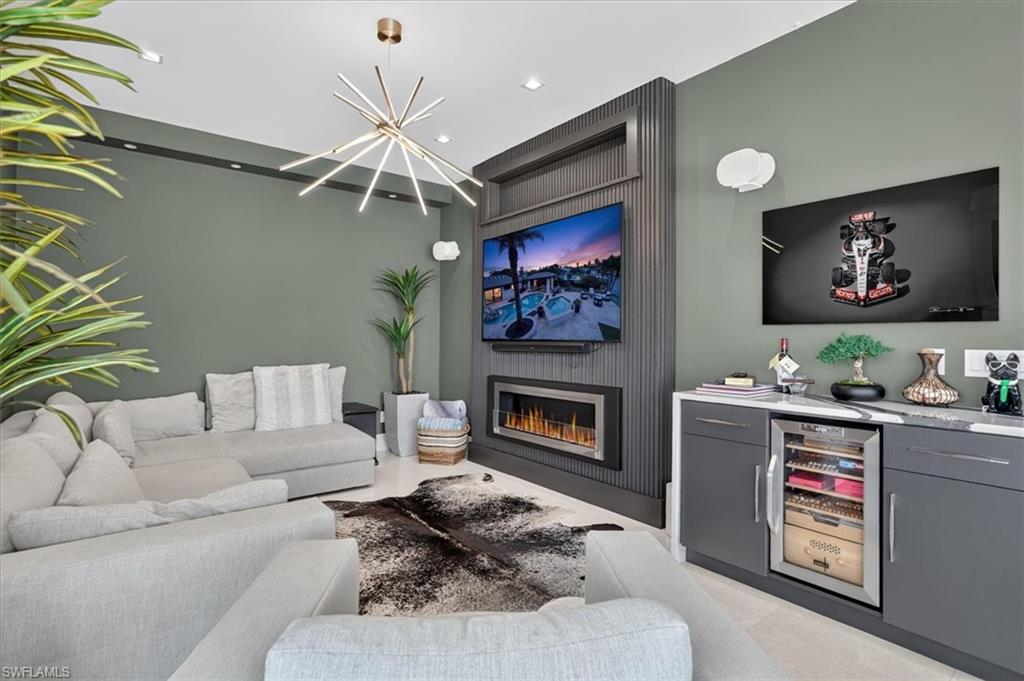 Additional Living Room with humidor & fireplace