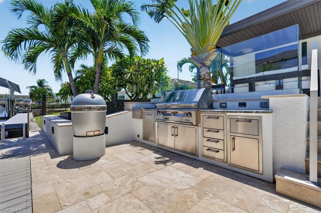 Outdoor kitchen located on the dock with grill & smoker