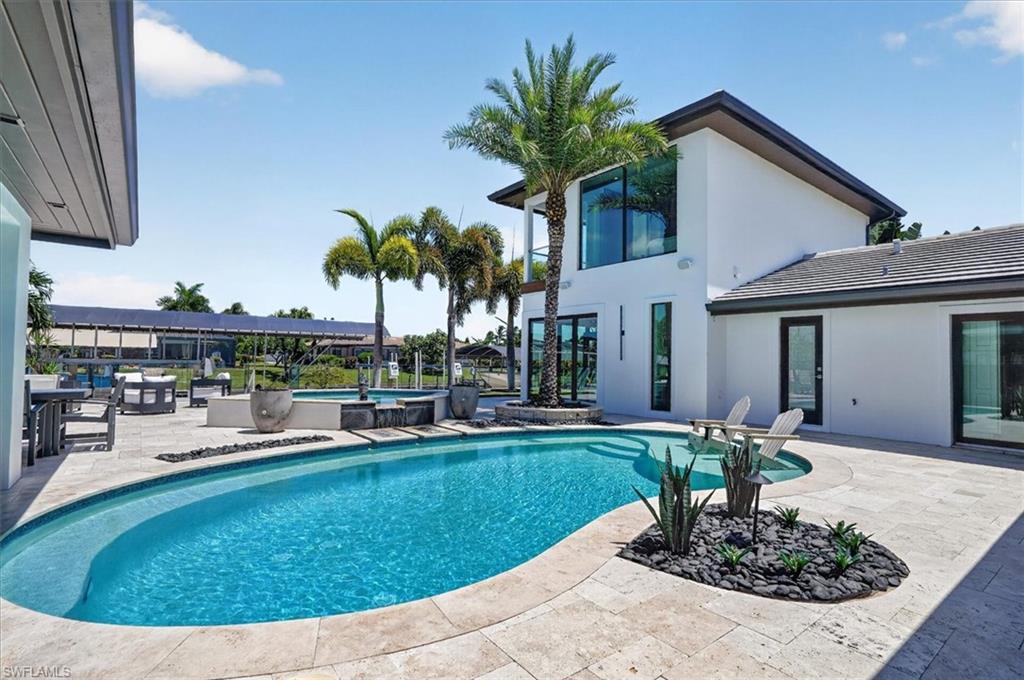 Travertine Deck with Salt Water pool & spa