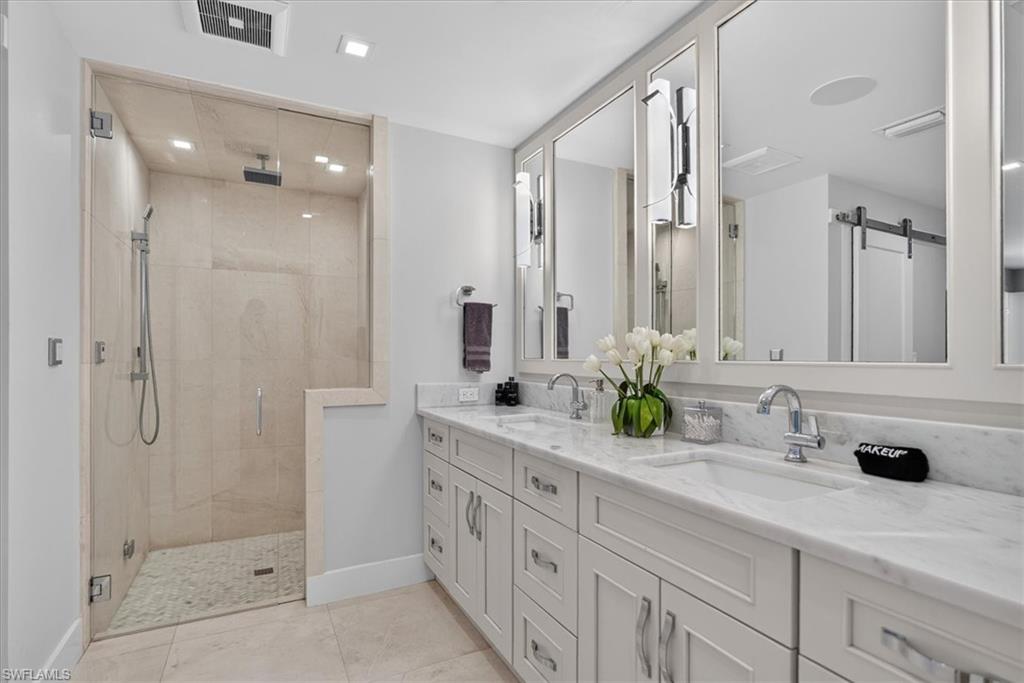Primary lower bath with spacious shower