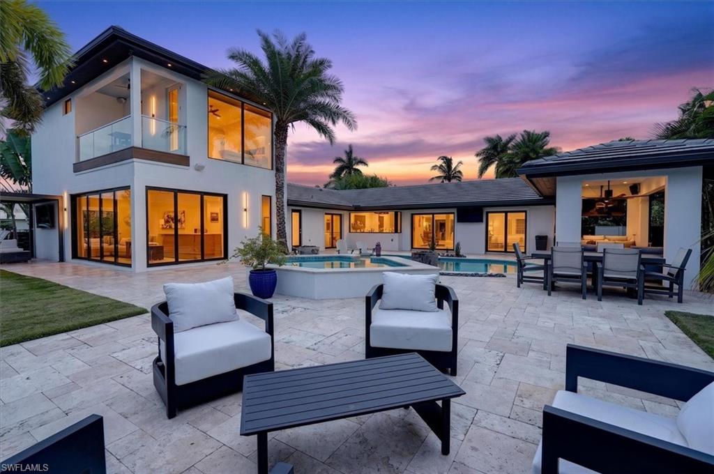 Beautiful landscaping & lighting complete the package