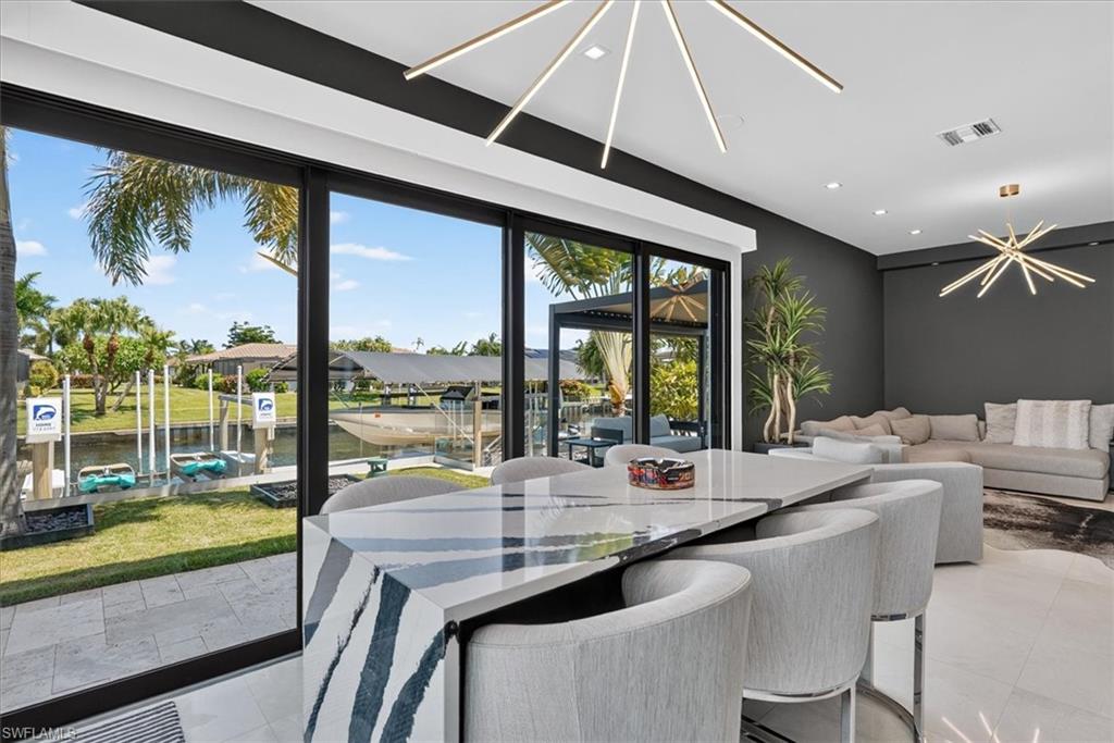 Incredible natural light looking out to the outdoor kitchen