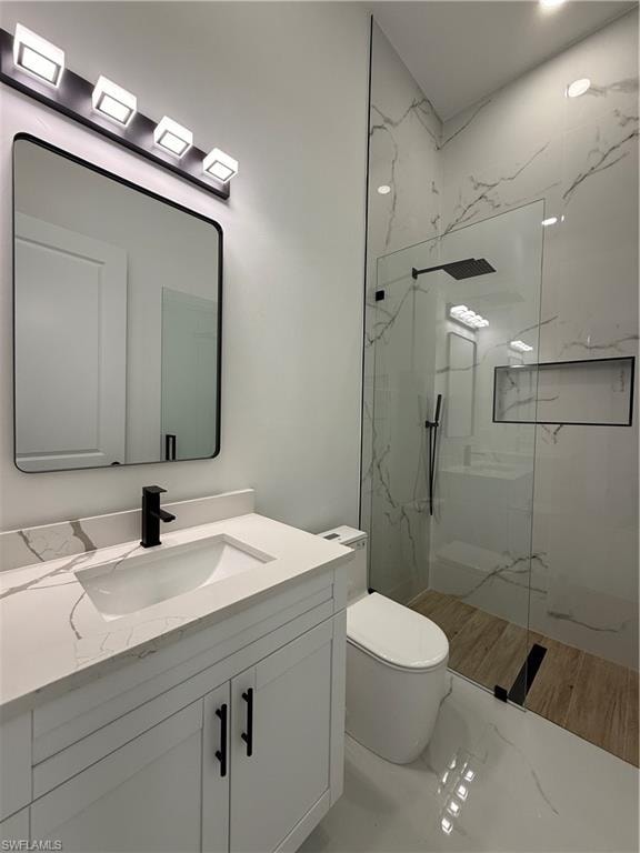 White vanity with a quartz countertop and integrated sink