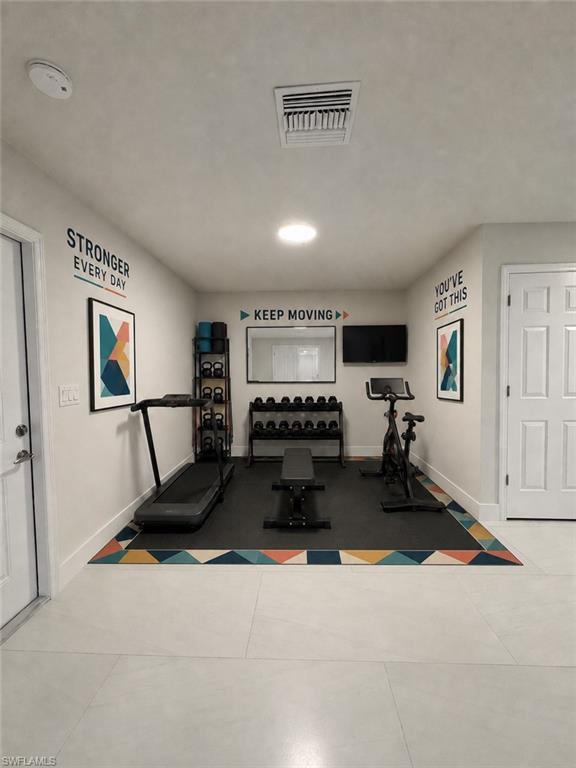 Downstairs gym virtually staged