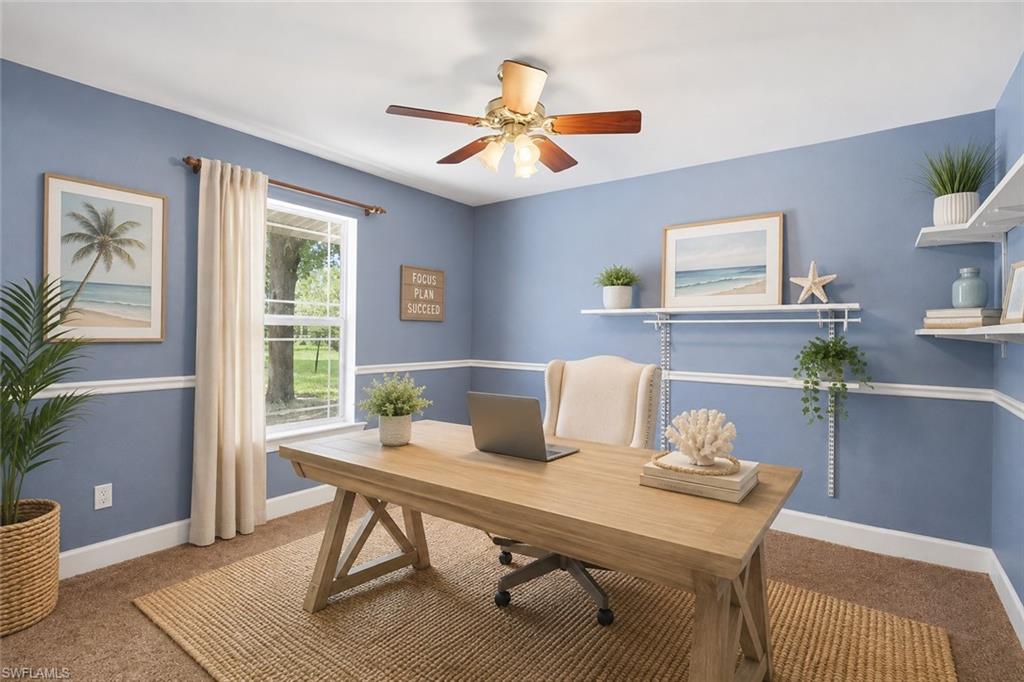 Window with outdoor scenery, wall-mounted shelving, crown molding, chair rail, and ceiling fan with integrated lighting