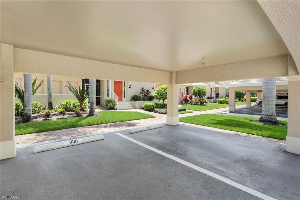 View of partially covered parking lot