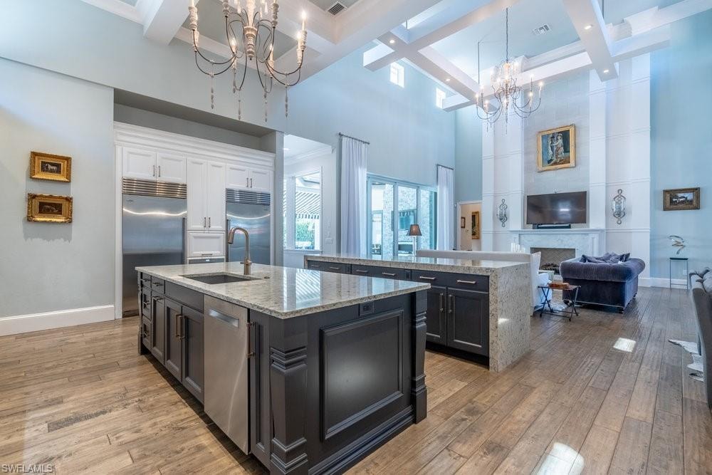 Double Island with storage cabinets on both sides, appliance garage