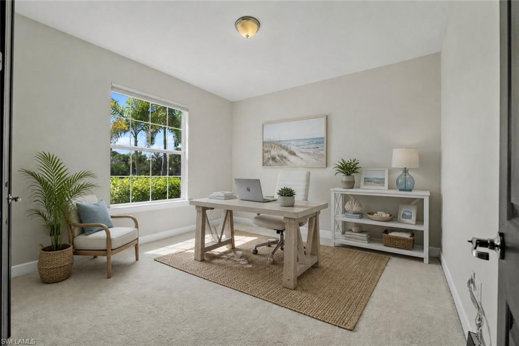 Light-toned carpeted flooring complements neutral wall tones