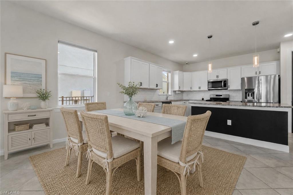 Open-concept living space with a dining area and kitchen