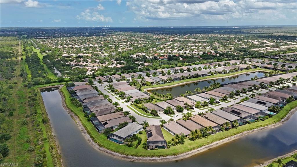 Neighborhood featuring a network of canals, residential properties, and surrounding green spaces