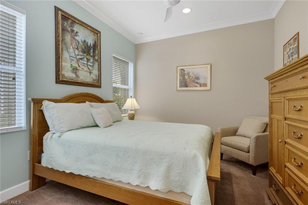Recessed lighting, ceiling fan, crown molding, window blinds, and wood-finish flooring