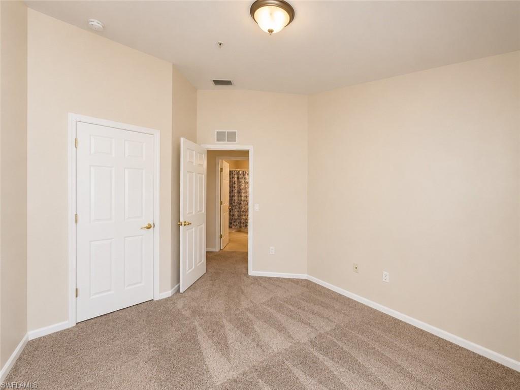 Neutral wall palette with carpeted flooring