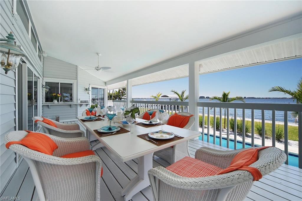 Covered outdoor patio with water frontage