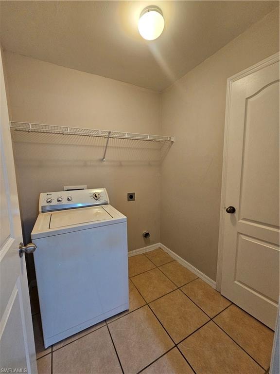 Tile flooring with a neutral finish, overhead flush mount lighting, and a wire shelving unit
